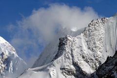 15 Clouds Swirl Around Khumbutse Between Nuptse and Guangming Peak From The Trail Up The East Rongbuk Valley To Mount Everest North Face Intermediate Camp In Tibet.jpg